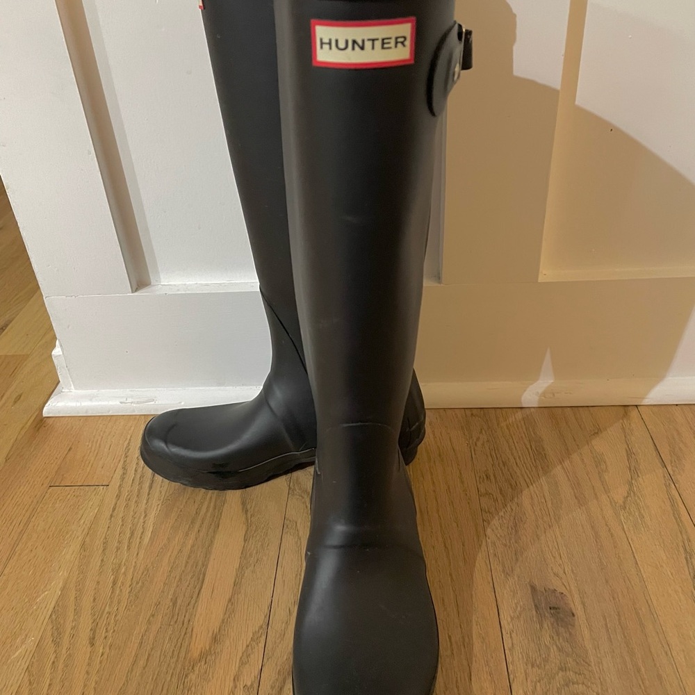 Tall matte black Hunter boots